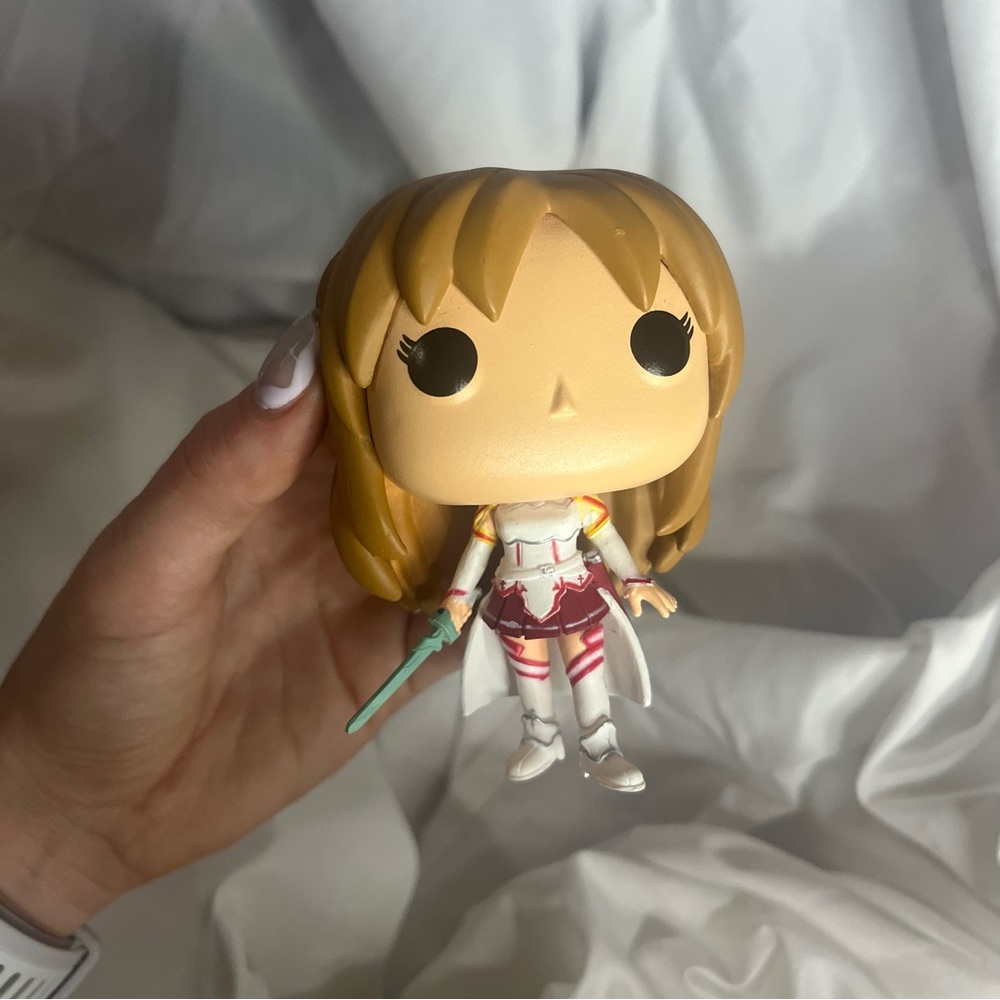 Funko Pop Figure with Blonde and White Colors